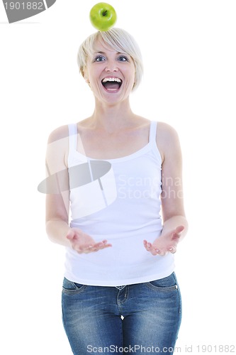 Image of happy  young  woman eat green apple isolated  on white