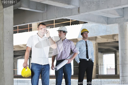 Image of Team of architects on construciton site