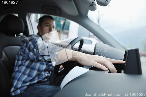 Image of man using car navigation