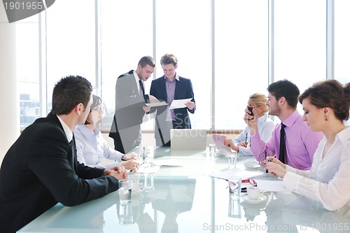 Image of group of business people at meeting