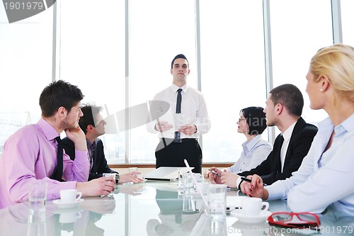 Image of group of business people at meeting