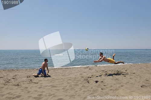Image of male beach volleyball game player