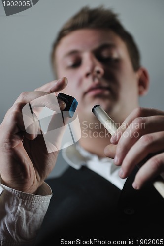 Image of young man play pro billiard game 