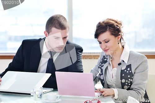 Image of group of business people at meeting