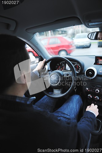 Image of man using car navigation