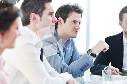 Image of group of business people at meeting