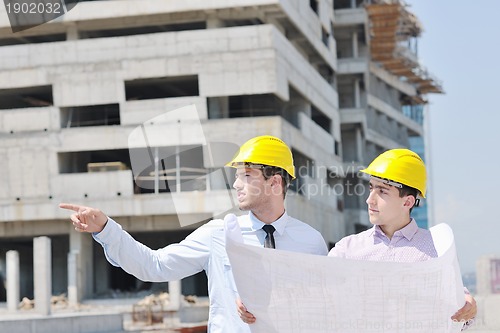 Image of Team of architects on construciton site