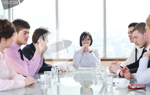 Image of group of business people at meeting