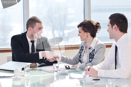 Image of group of business people at meeting