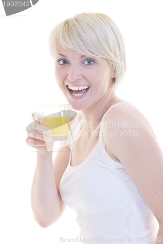 Image of Young woman drinking orange juice isolated over white background