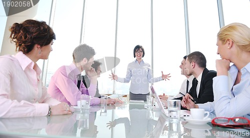 Image of group of business people at meeting