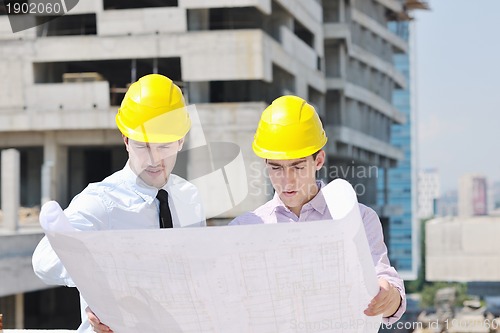 Image of Team of architects on construciton site