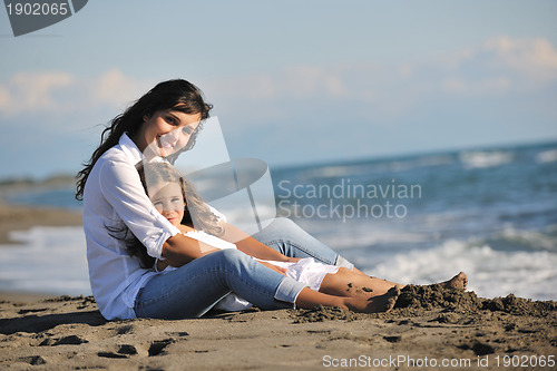 Image of mom and daughter portrait on beach