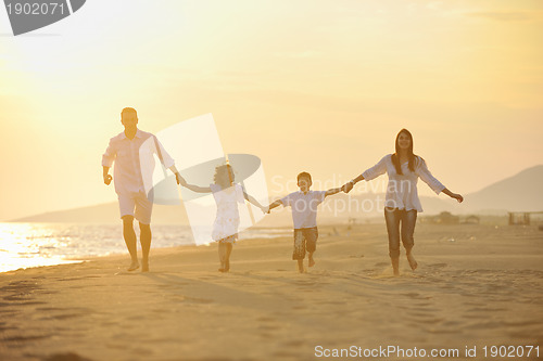 Image of happy young family have fun on beach