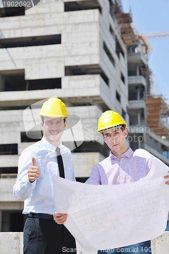 Image of Team of architects on construciton site