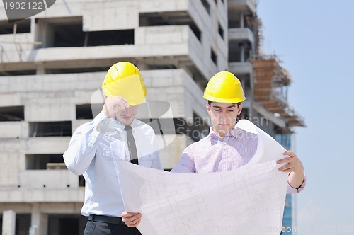 Image of Team of architects on construciton site