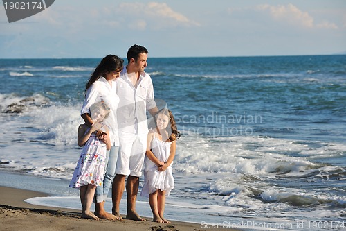 Image of happy young  family have fun on beach