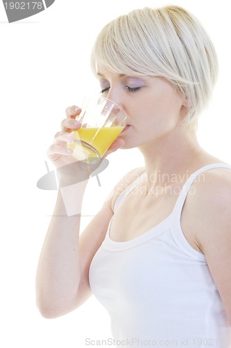 Image of Young woman squeeze orange juice