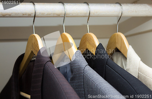 Image of Business suits in the closet