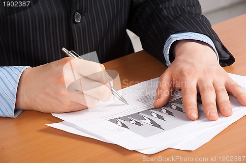 Image of businessman working in office