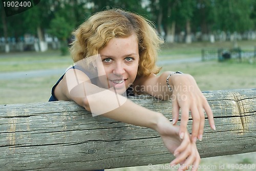 Image of Pretty woman in city park