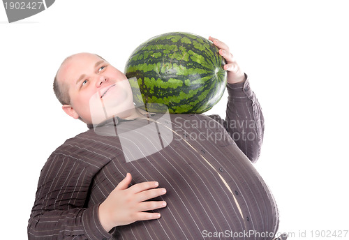 Image of Obese man carrying a watermelon