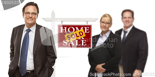 Image of Men and Woman with Real Estate Sign Isolated