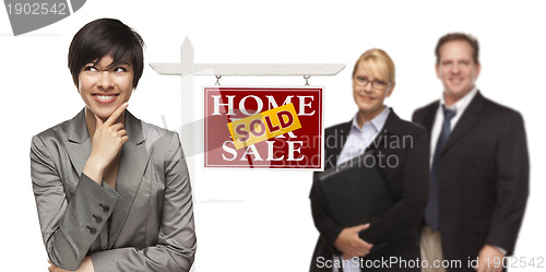 Image of Mixed Race People with Sold Real Estate Sign Isolated