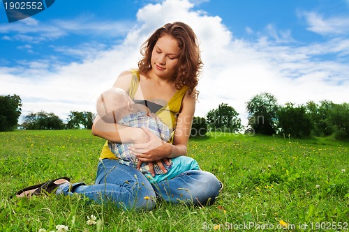 Image of baby breastfeeding