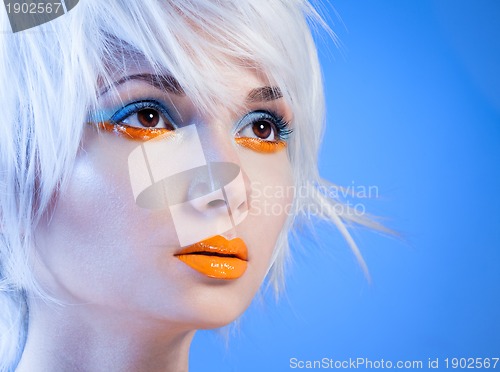 Image of attractive girl with orange lips