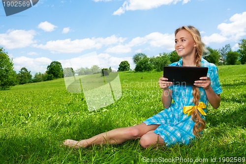 Image of happy student with tablet pc