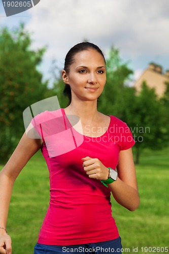 Image of beautiful jogger in pink t-shirt