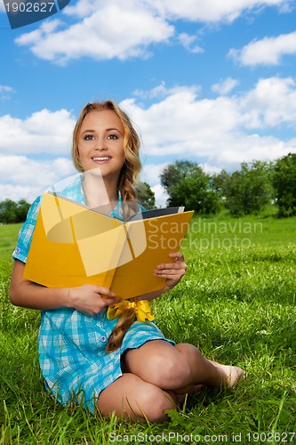 Image of nice student on the lawn