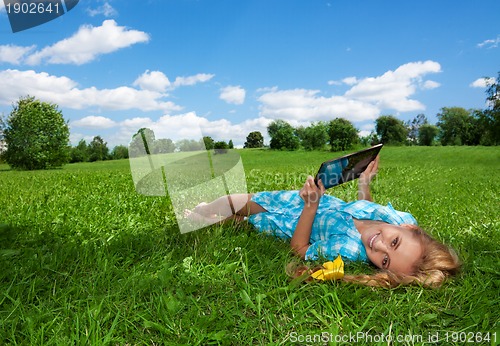 Image of happy browsing in the park