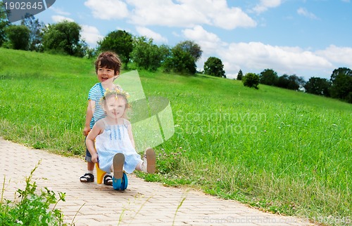 Image of kids playing in the park