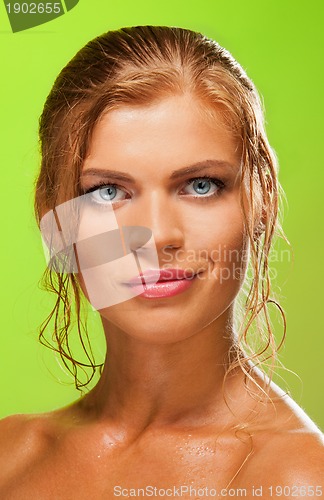 Image of blue-eyed blonde  girl enface