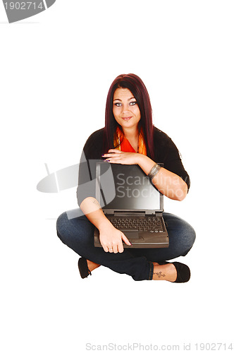 Image of Woman holding laptop.