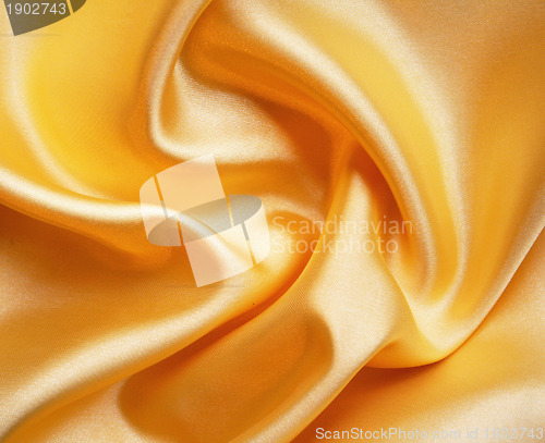 Image of Smooth elegant golden silk as background 