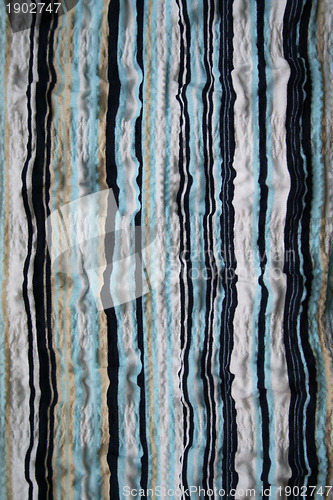 Image of Blue, white, beige and black strips fabric background
