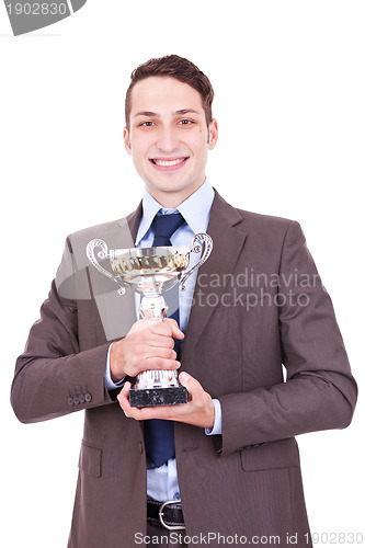 Image of winning businessman holding his award