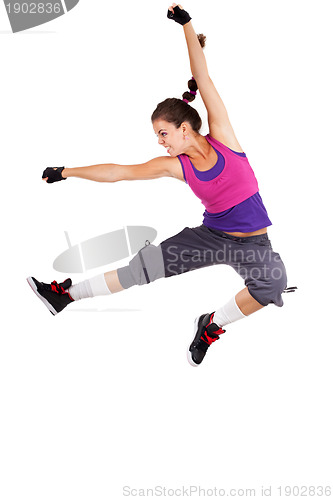 Image of young woman dancer jumping