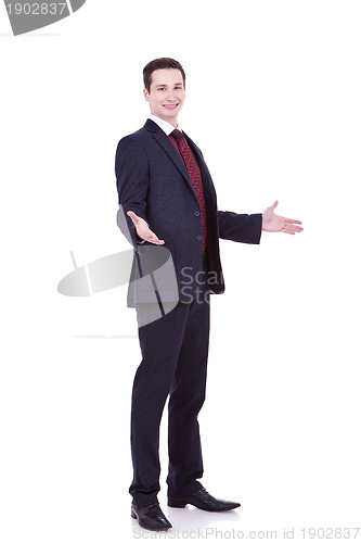 Image of young business man welcoming