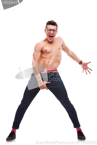 Image of excited shirtless man screaming