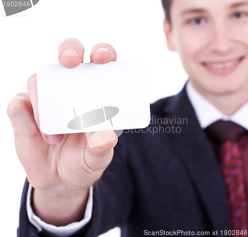 Image of business card in business man's hand