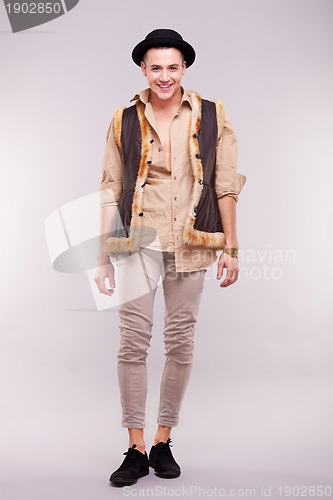 Image of funny young man smiling