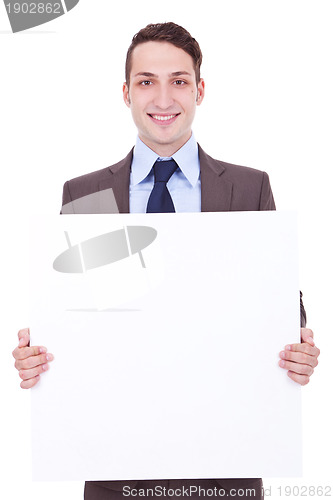 Image of business man showing blank signboard