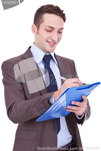 Image of business man writing