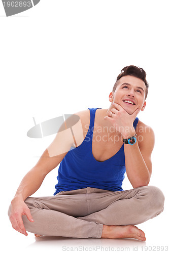 Image of man thinking and looking up at something