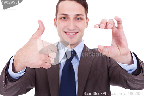 Image of man showing a blank business card