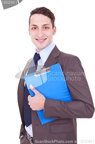 Image of Businessman smiles with clipboard in his hand